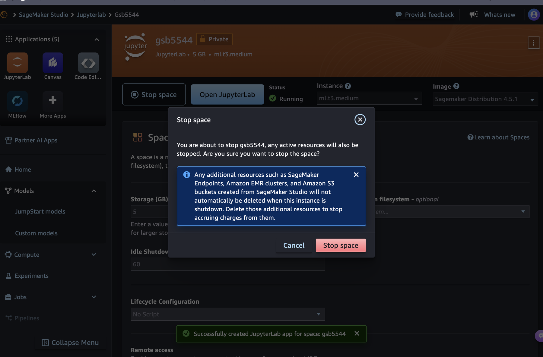 The gsb5544 space page with status Running, a Stop space button next to Open JupyterLab, and a Stop space confirmation dialog with Cancel and Stop space buttons.